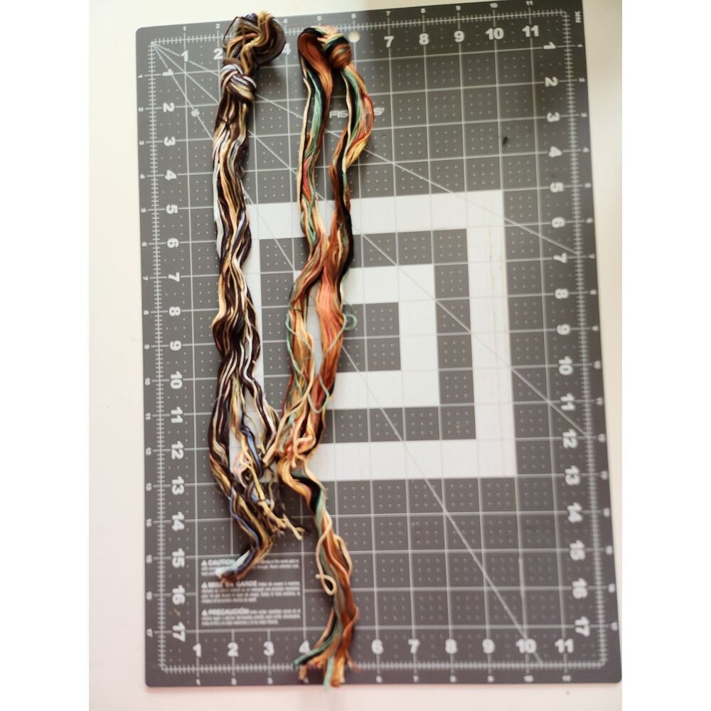 Various Strands of Embroidery Floss B15